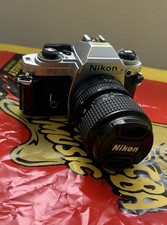 Nikon FG 35mm SLR Film Camera w/ Zoom Lens  Action Grip
