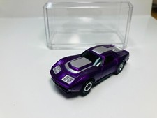 AFX tras CANDY PURPLE  CORVETTE AW Chassis  Display case Aurora NEW 