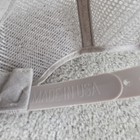 Beige US Air Force Indian Chief trucker hat with tan fabric and white “MADE IN U.S.A.” text on strap.