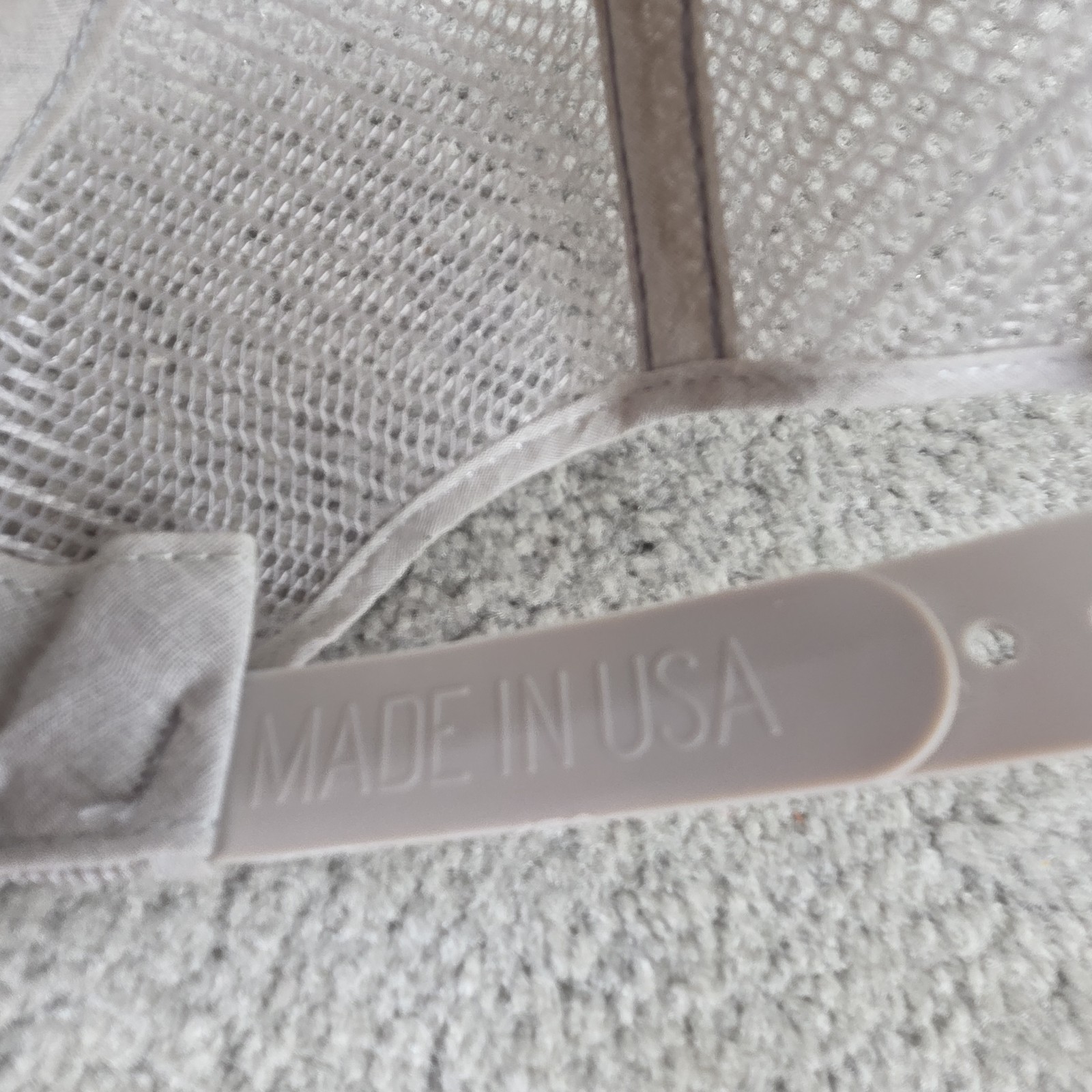 Beige US Air Force Indian Chief trucker hat with tan fabric and white “MADE IN U.S.A.” text on strap.