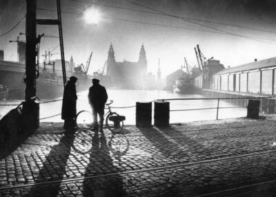 Two men talking as they stand in princes Dock in Central Liverpool- Old Photo