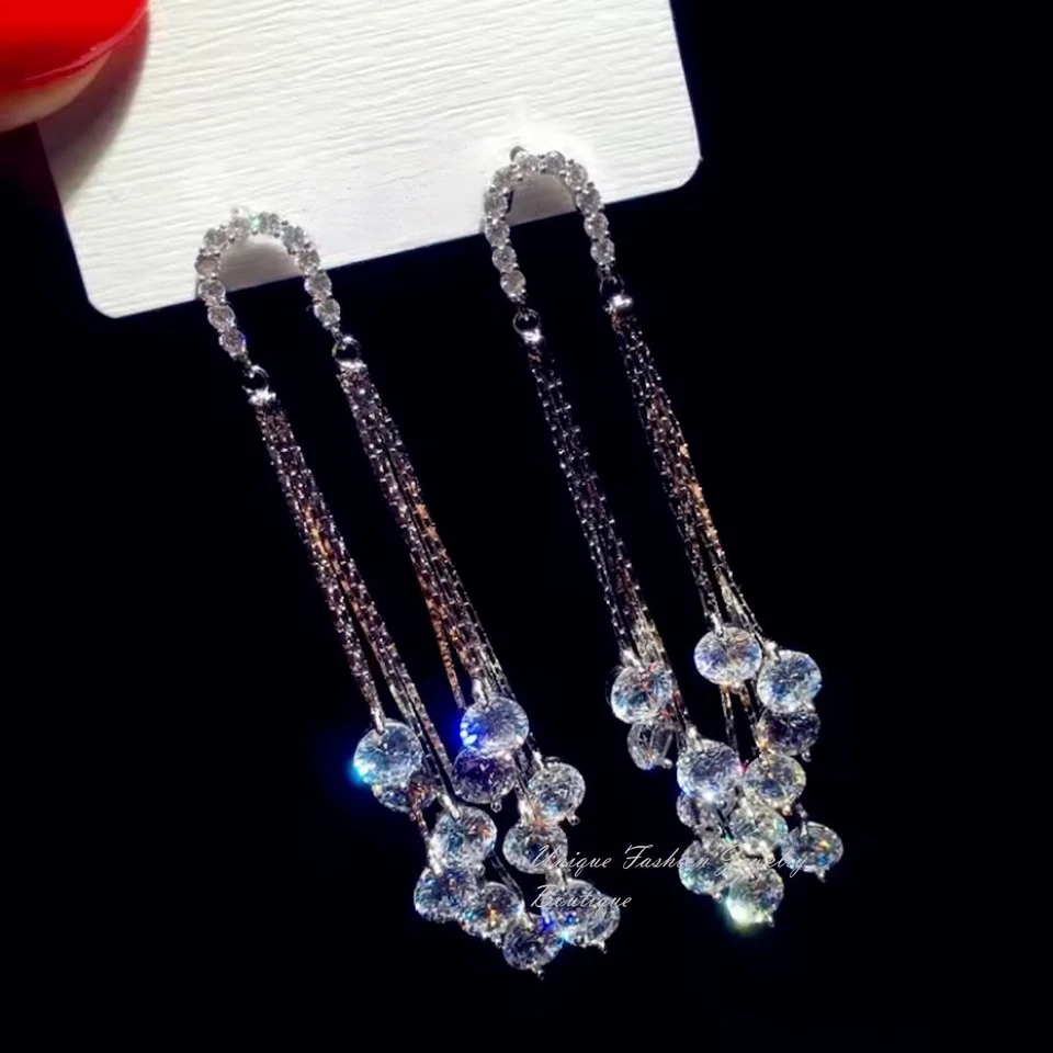 Pendientes araña largos de borla enchapados en oro blanco de 18k hechos con diamante Swarovski Foto 4 de 4