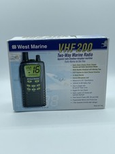 West Marine VHF200 Wireless VHF Radio Transceiver Unit and charge cradle