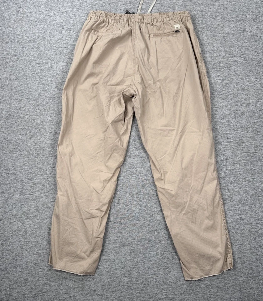 Pantalones Vuori Ripstop para mujer grandes beige dobladillo crudo cintura elástica cordón senderismo Foto 2 de 4