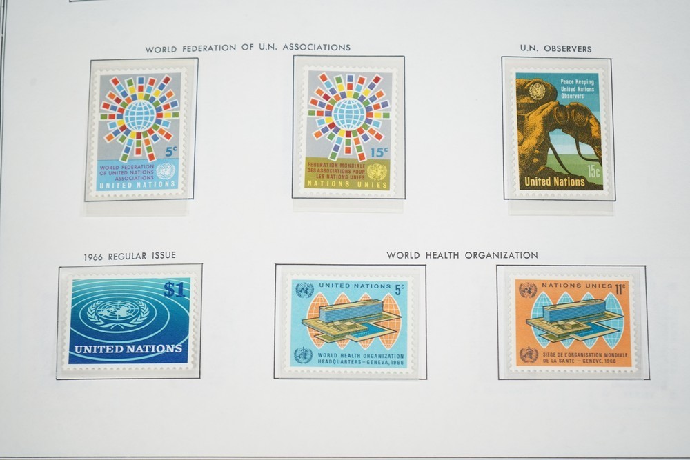 UN 1950s-1990s COLLECTION OF OVER 500 STAMPS ALL MINT STORED IN HARRIS ALBUM