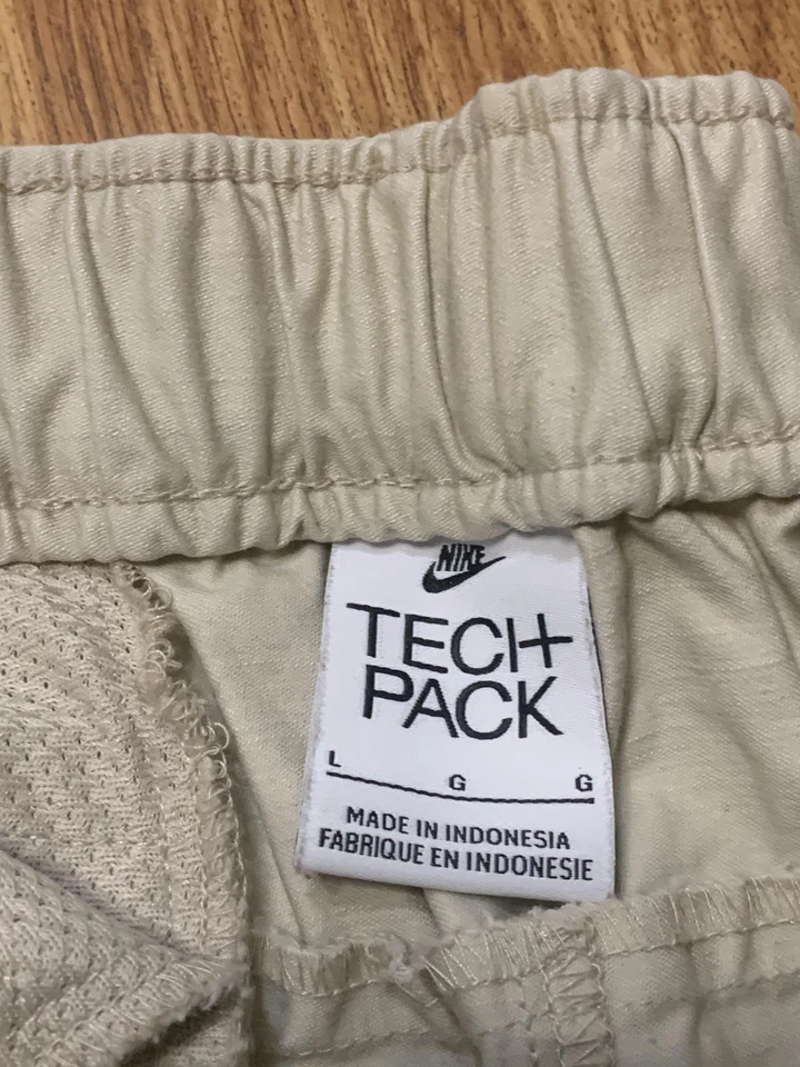 Nike Tech Pack Pantalones Para Hombre Grandes Caqui Algodón Tejido Cinturón Cremallera Bolsillo Cónico Foto 3 de 4