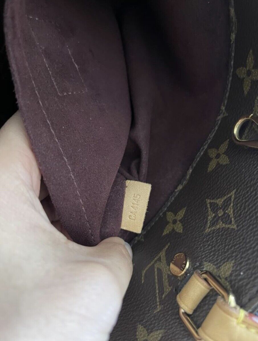 Montaigne cloth handbag Louis Vuitton Brown in Cloth - 26126866