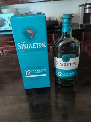 Empty Bottle And Box Of The Singleton 12-year-old Single Malt Scotch Whiskey