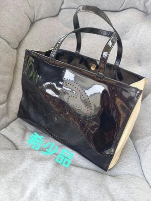 Sac fourre-tout Tory Burch en cuir verni noir quincaillerie dorée femmes... - Photo 1/4