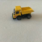 Vtg 70s Tonka Pressed Steel Yellow Dump Truck w/ Tilt Bed Made in Japan 3 1/2"