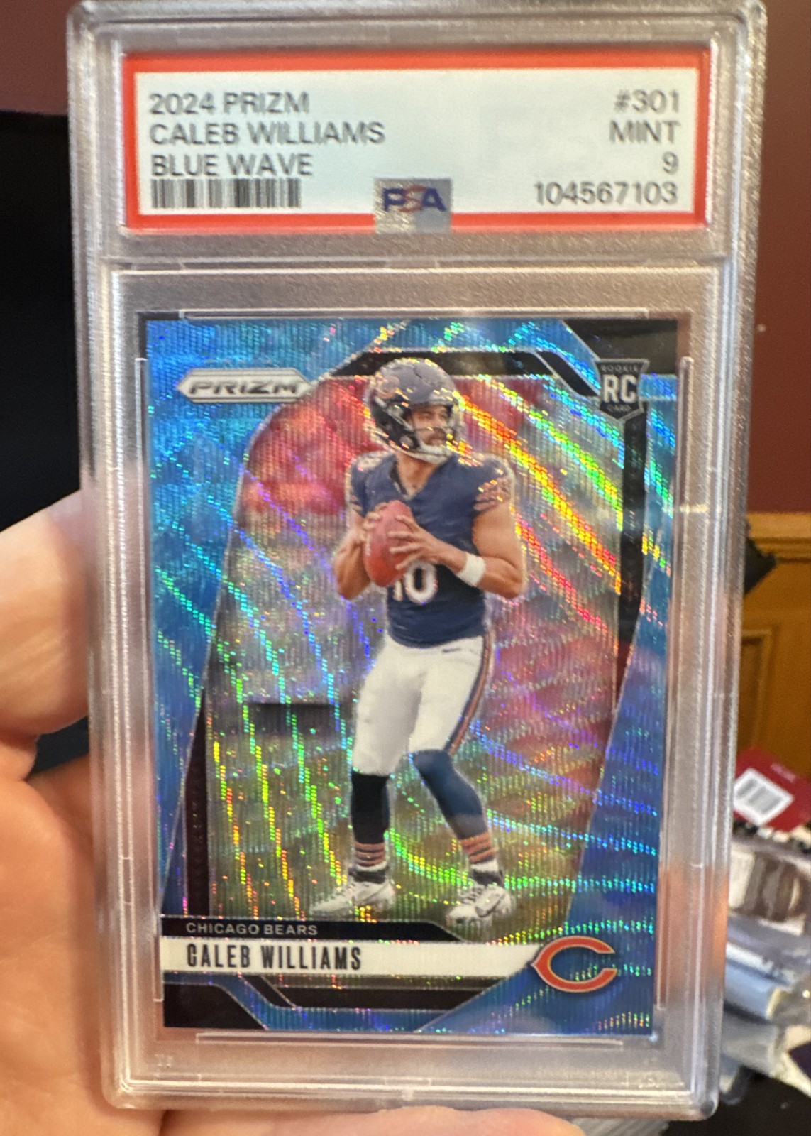 2024 Panini Prizm - Rookies Caleb Williams #301 Blue Wave Prizm /230 (RC) PSA 9