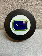VANCOUVER CANUCKS Stick Logo NHL PUCK White