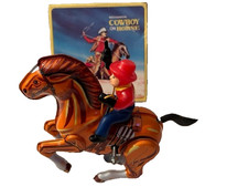 COW BOY CON CAVALLO a molla-giocattolo vintage anni 80' in latta-made in KOREA