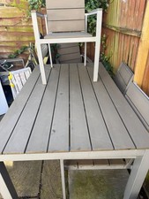 garden table and chairs. Made of bautiful matt colour metal. easy to clean.