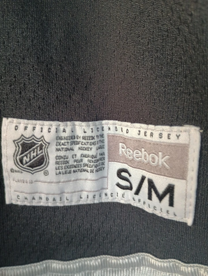 Camiseta de hóquei Reebok Los Angeles Kings Dustin Brown #23 NHL juvenil tamanho P/M - Imagem 2 de 4