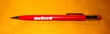 PRE-OWNED SCRIPTO RED MECHANICAL PENCIL W/OXFORD CHEM, ADVTISING ALONG WITH 1.18