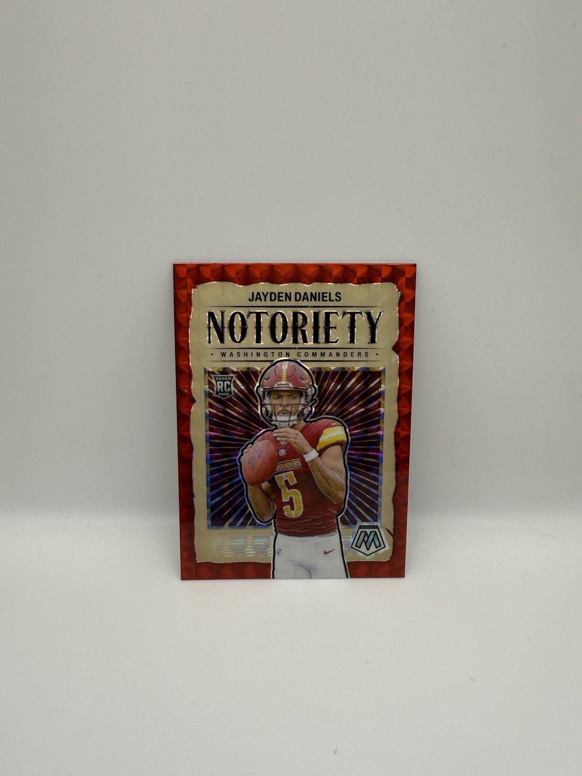 2024 Mosaic Notoriety Red #19 Jayden Daniels