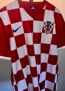 red and white checkered soccer jersey