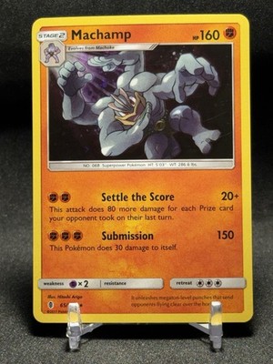 Machamp - 65/145 (Cosmos Holo) - Blister Exclusives (BLE)