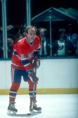 Guy Lafleur Montreal Canadiens skates on the ice with the puck at - Old Photo