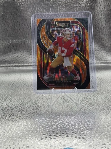 2024 Panini Select - Premier Level Brock Purdy #124 Orange Shock Prizm /399