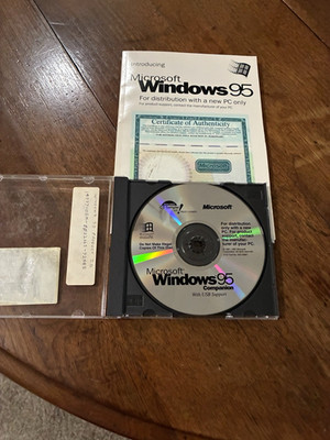 Vintage legacy Microsoft Windows 95 disc and user manual, untested estate find