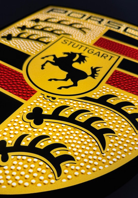 Glowing Porsche logo on the wall to the Connoisseur's Garage !! 911 Gadget