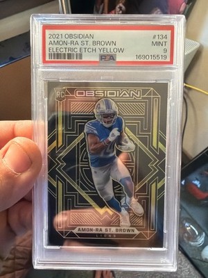 2021 Obsidian Amon-ra St.Brown Electric etch yellow /25 psa 9