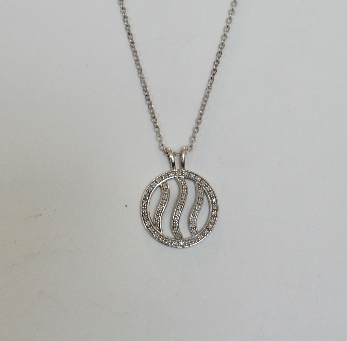 Vintage Sterling Sliver 925 Round Circle w /swirl in center with 60 CZ stones