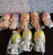 vintage Kewpie - Style Plastic Dolls Still In Packing . 5 Dollars Each .