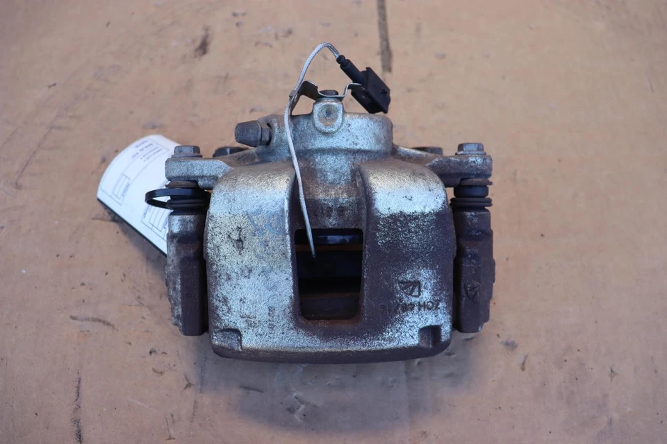 Pinza de freno trasera derecha Dodge Ram Promaster 1500 2014-2021 tracción delantera OEM Foto 2 de 4