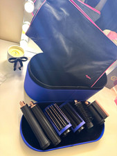 Genuine Dyson airwrap parts with Storage bag included (parts only). Used once