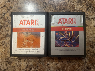 Lot of 2 Atari 2600 Game Cartridges Phoenix Swordquest Earthworld Tested