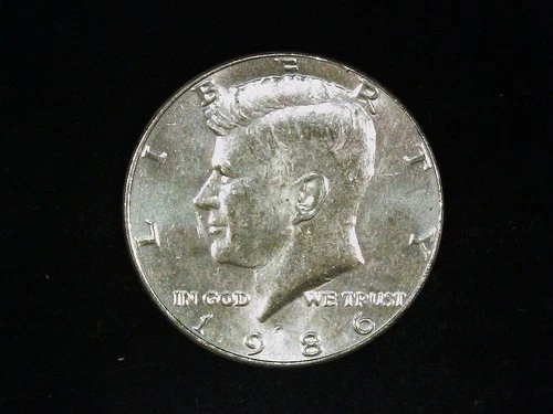 1986-P Kennedy Half Dollar AU++ (1). Free Shipping!