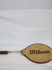 vintage Wilson tennis racket with zip on cover
