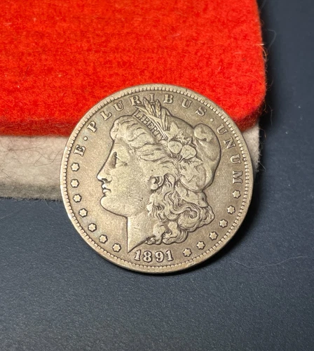 (#102572) Morgan Dollar:  1891 CC  F/VF.  Better date.  (See video!)