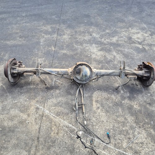Rear axle beam with reducer