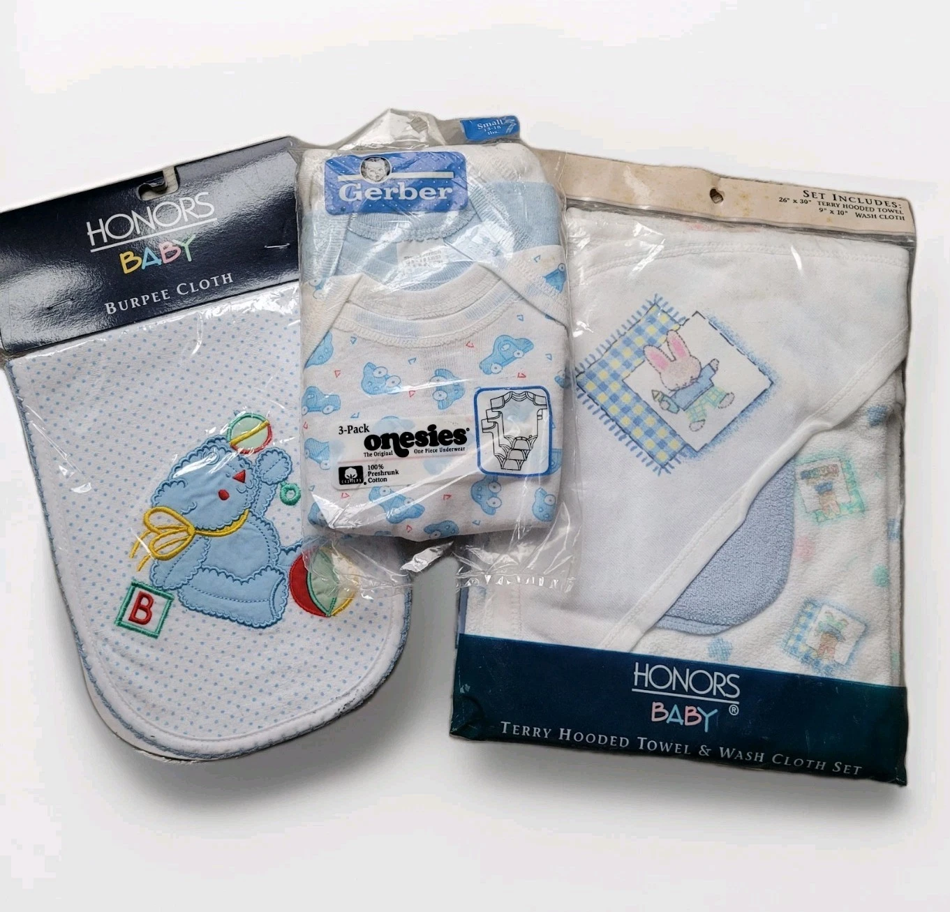 Vintage New Old Stock Baby Boy Bundle - Gerber Onesies, Bunny Towel & Bear Burp
Opens in a new windo
