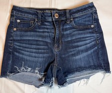 American Eagle Super Stretch Distressed Raw Hem Shorts Size 4 Medium Wash