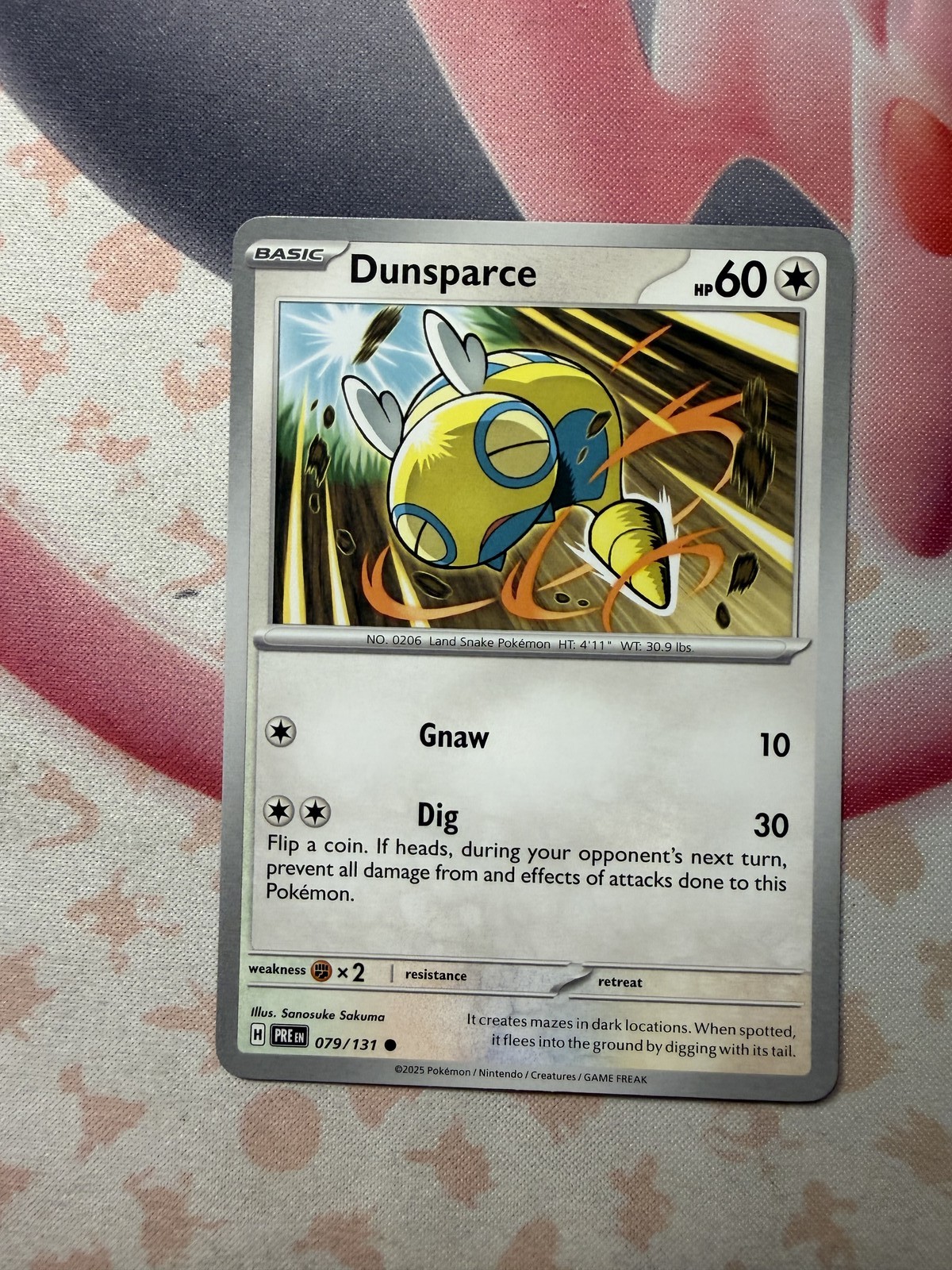 Dunsparce Common SV: Prismatic Evolutions 079/131 NM English Pokemon Card