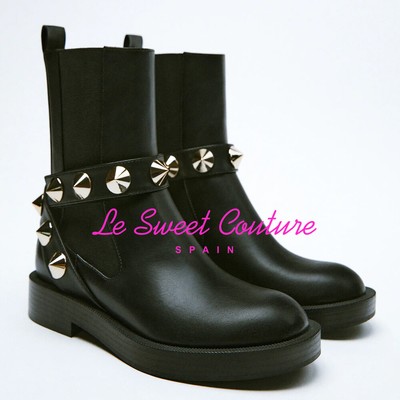 black studded strap ankle boots