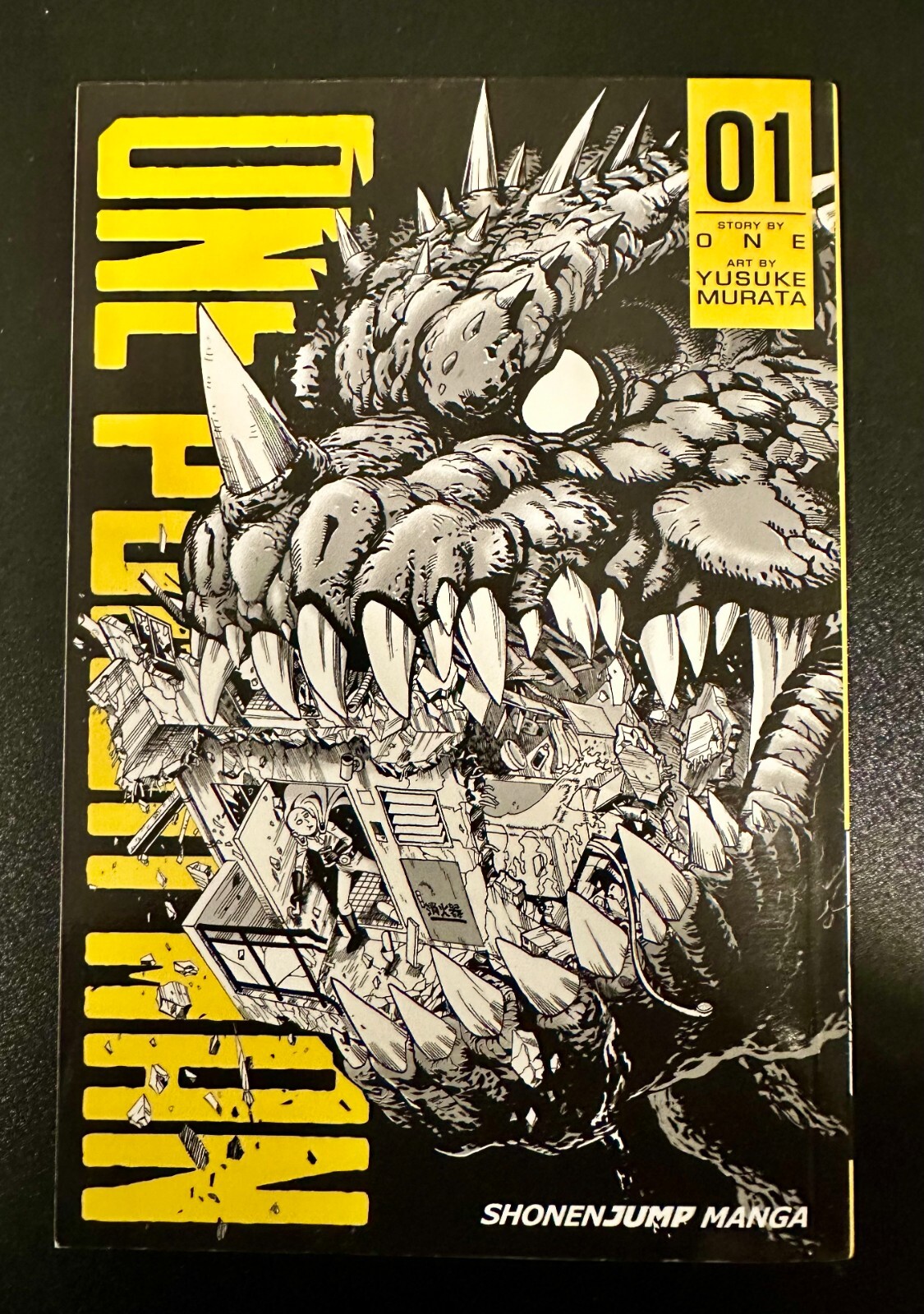 One-Punch Man Volume 1 by One (Shonen Jump Manga Edition, First Printing)