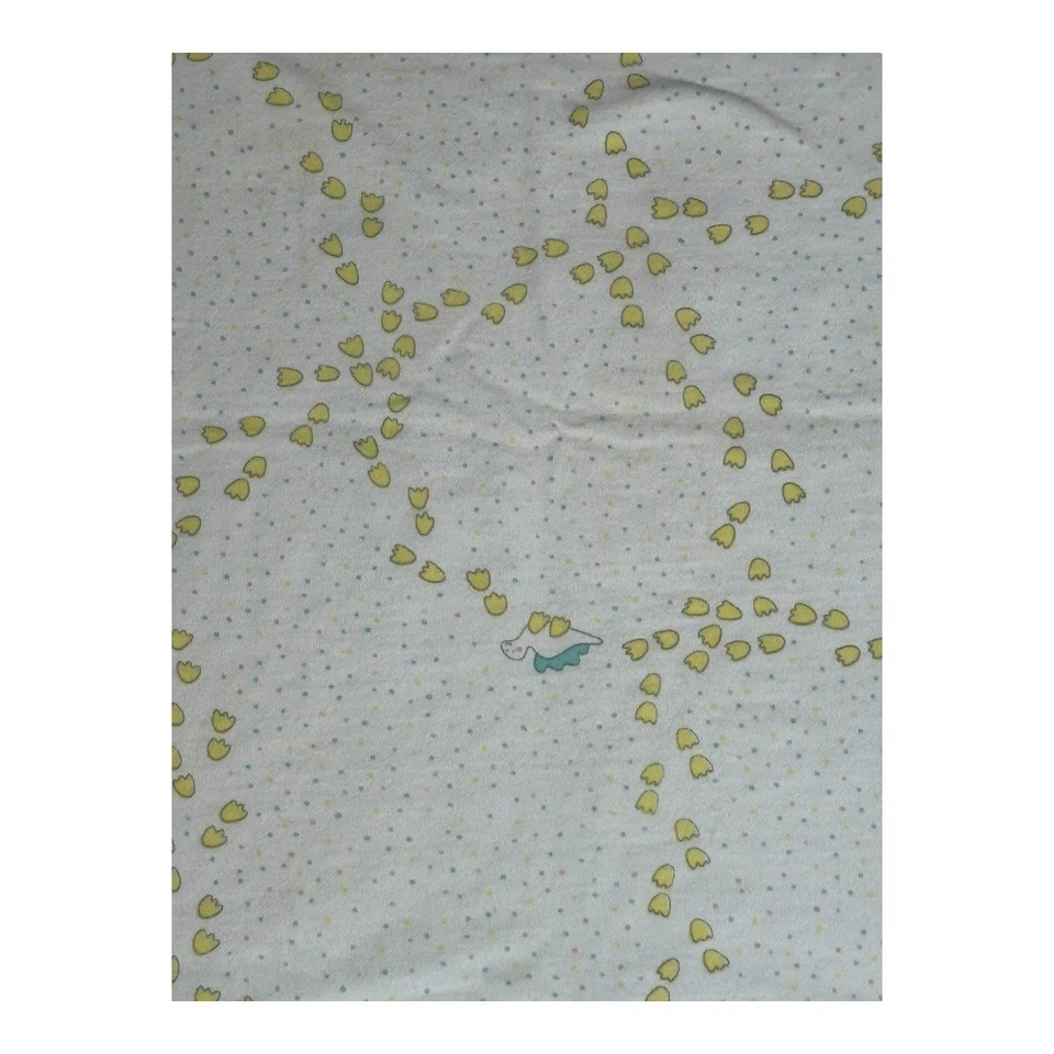 Manta bebé Carter's vintage 100 % algodón dinosaurios y estampados de patas blanco amarillo Foto 2 de 4