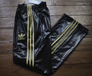 tuta lucida adidas