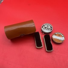 vintage shoe shine kit featuring "Nugget" brand shoe polish and brushes