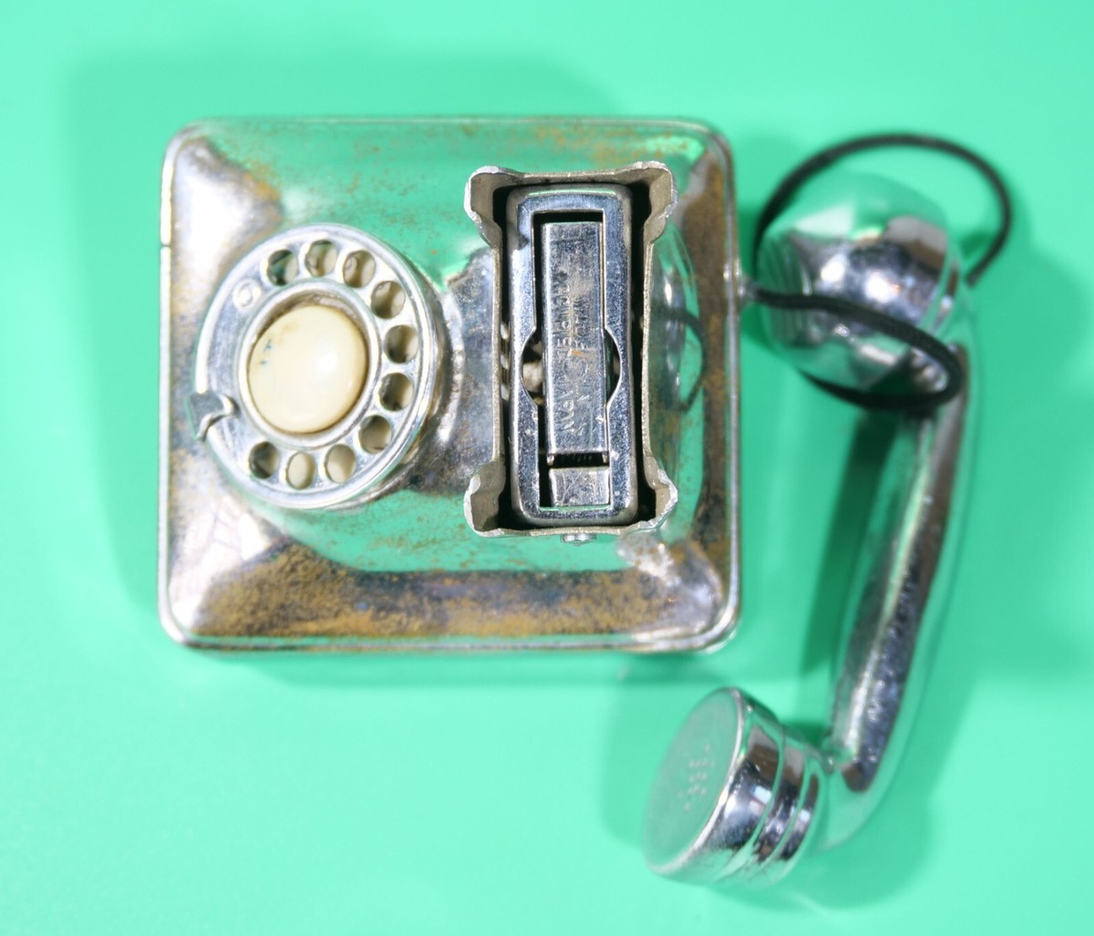 1940's Peacock Brand Novelty Rotary Phone Lighter In Chrome for