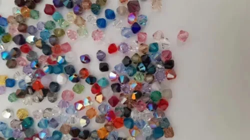 Mezcla de 100 cuentas bicónicas de cristal genuino Swarovski de 6 mm #5301 en colores surtidos - Imagen 4 de 4