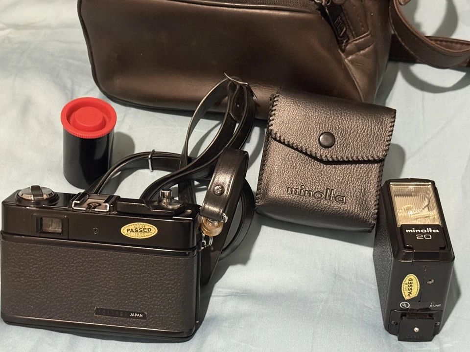 Cámara fotográfica y estuche vintage Minolta Hi-Matic G2 cuerpo negro 35 mm - PROBADA Foto 3 de 4