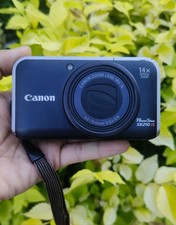 Canon PowerShot SX210 IS 14.1MP Digital Camera - Black. English Language