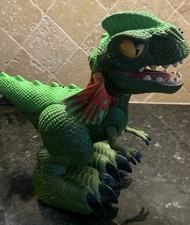 2008 Screature dinosaur toy - interactive -snaps, growls, yawns, squirts water.